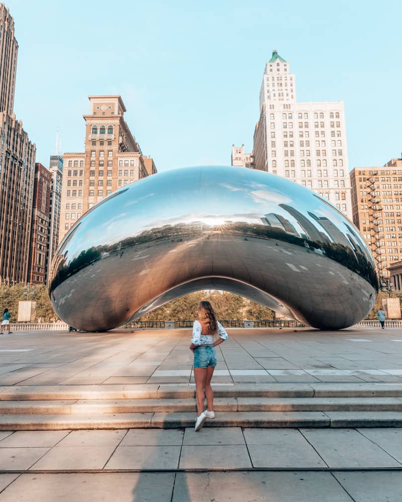 girl standing in front of the bean