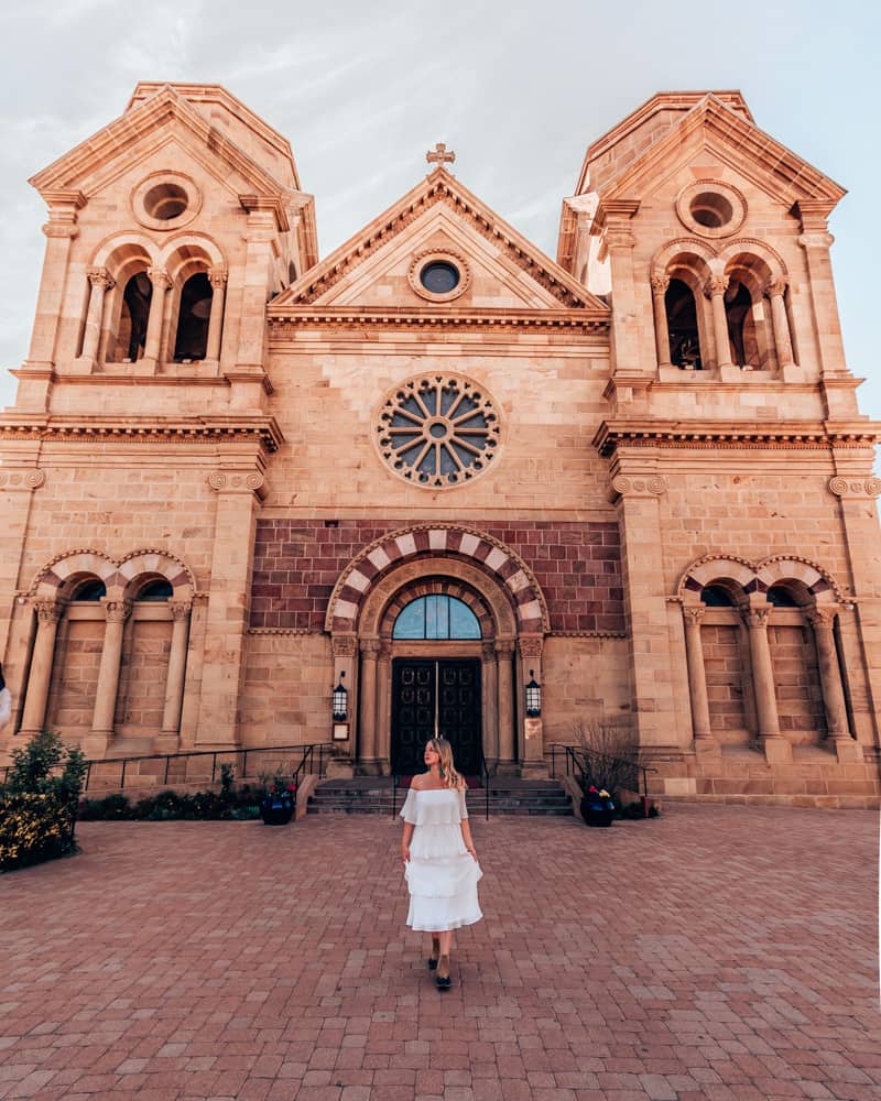 girl standing in front of Cathedral