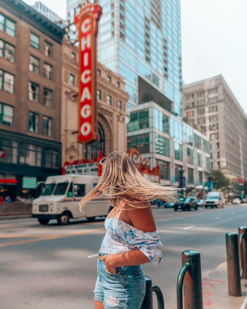 girl standing outside Chicago theatre