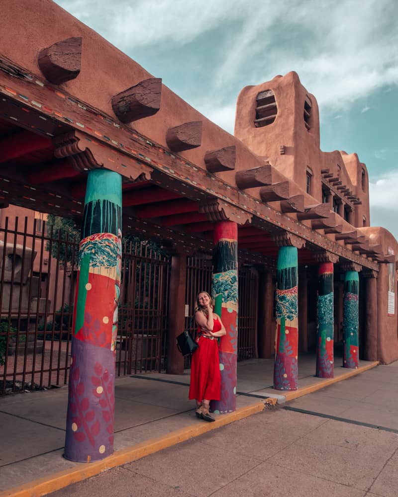 standing in front of the IAIA museum of contemporary art in Santa Fe