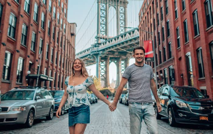 couple in front of Manhattan bridge