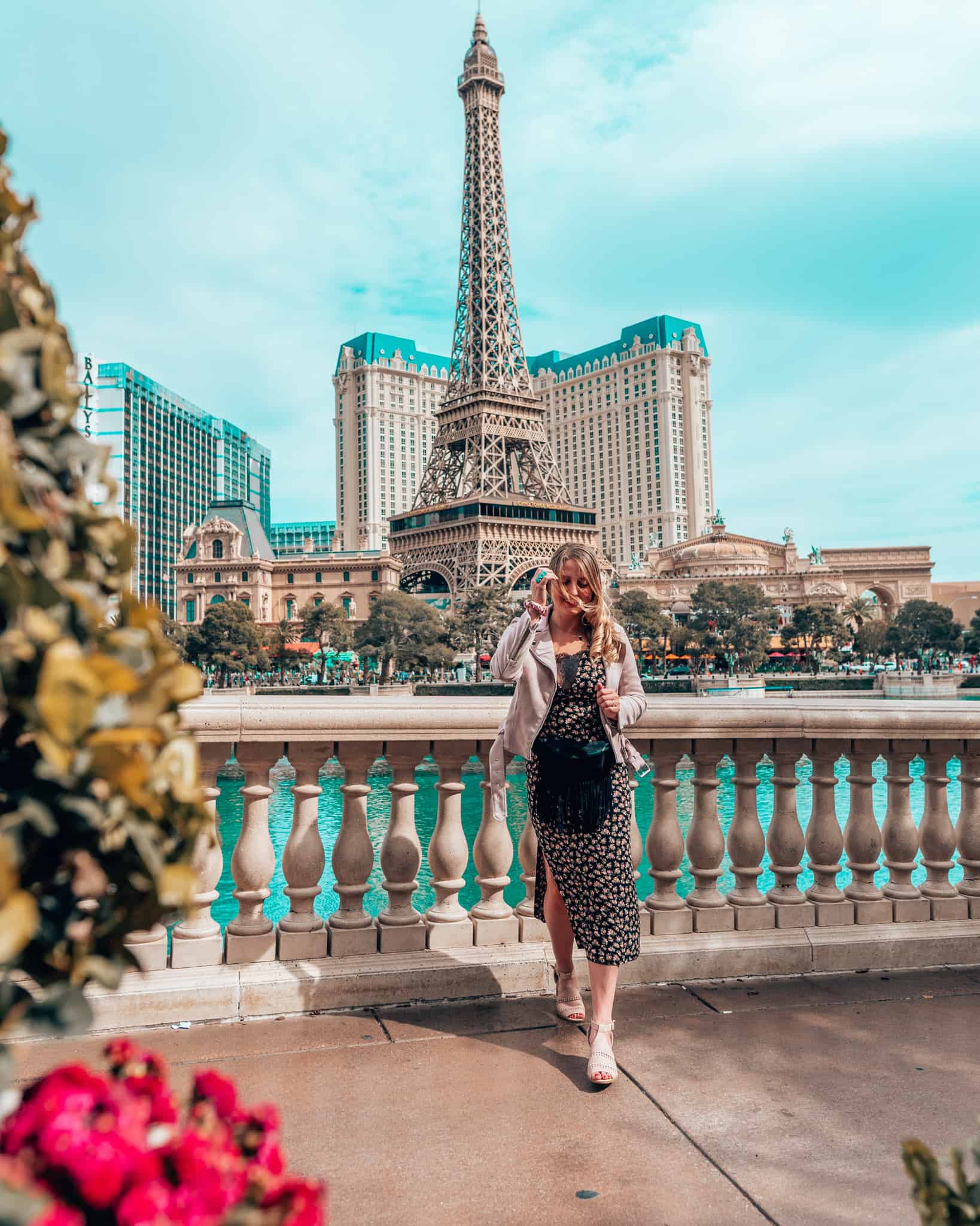 standing in front of fake Eiffel Tower in Las Vegas