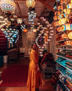 girl in Magic Art lamp store in Santa Fe