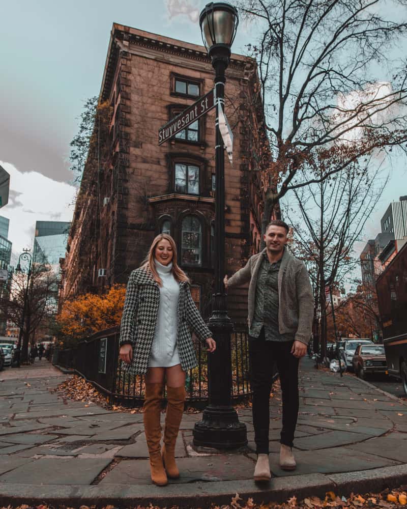 couple standing on a street corner